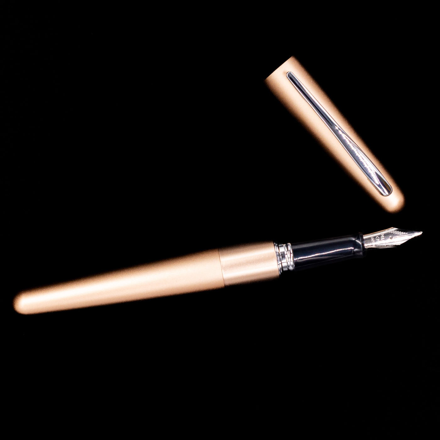 An overhead shot of the Pilot Metropolitan Fountain Pen - Plain Gold uncapped.