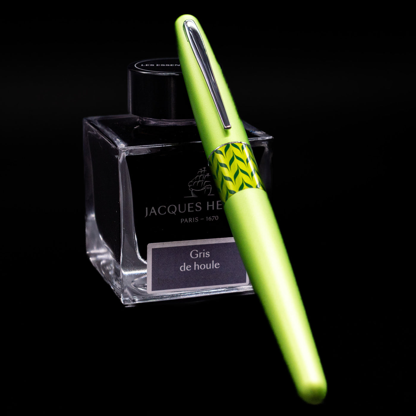 Pilot Metropolitan MR Retro Pop Fountain Pen - Green capped, leaning against an ink bottle. 