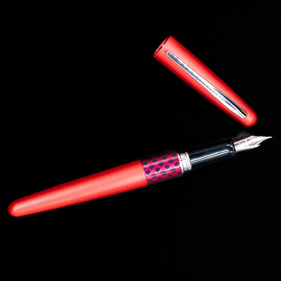 An overhead view of the Pilot Metropolitan MR Retro Pop Fountain Pen - Red uncapped.