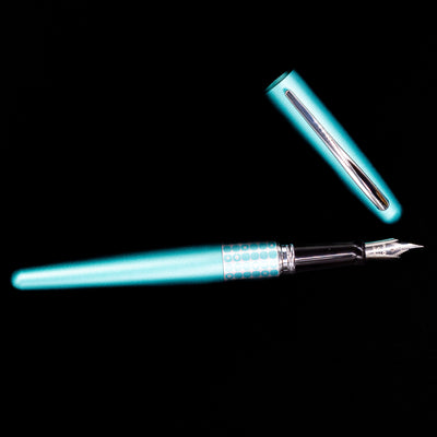 An overhead view of the Pilot Metropolitan MR Retro Pop Fountain Pen - Turquoise uncapped.