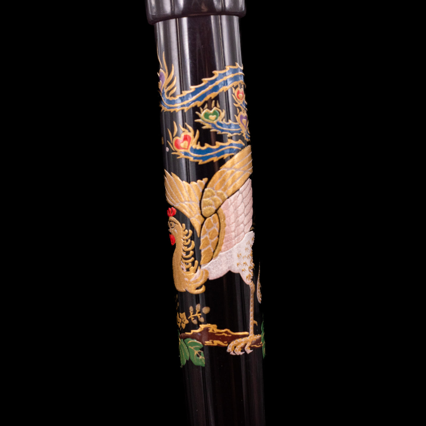 A close-up shot of the phoenix on the body of the Pilot Namiki Sokuikinen HouOu (Double Phoenix) Maki-e Fountain Pen by Kyusai Yoshida - Preowned.