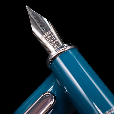  A macro shot of the nib with its intricate detailing and logo engraving for the Pilot Prera Fountain Pen - Empress Teal.