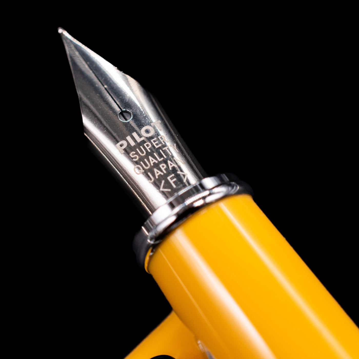  A macro shot of the nib with its intricate detailing and logo engraving for the Pilot Prera Fountain Pen - Honey Yellow.