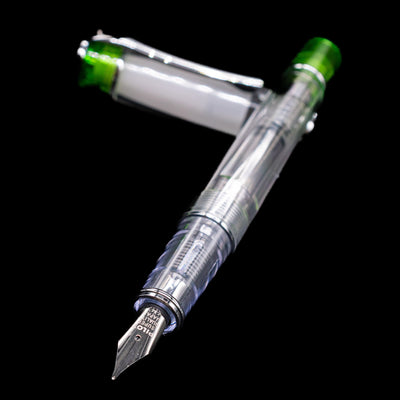 Pilot Prera Fountain Pen - Light Green laying across its own cap, crossed, with a focus on the nib.