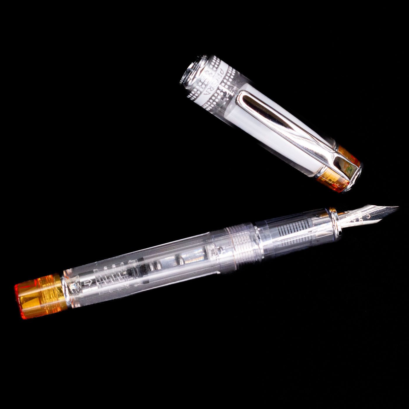 An overhead view of the Pilot Prera Fountain Pen - Orange uncapped.