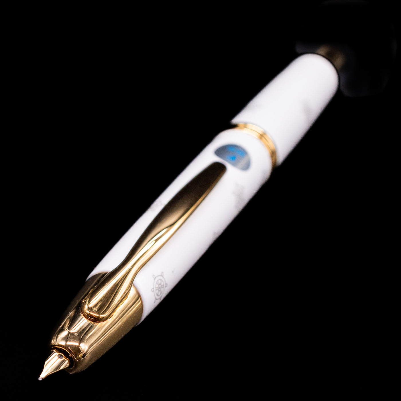 Pilot Vanishing Point Limited Edition Fountain Pen - Disney 100 Mickey Mouse laying in full view with a focus on the nib.