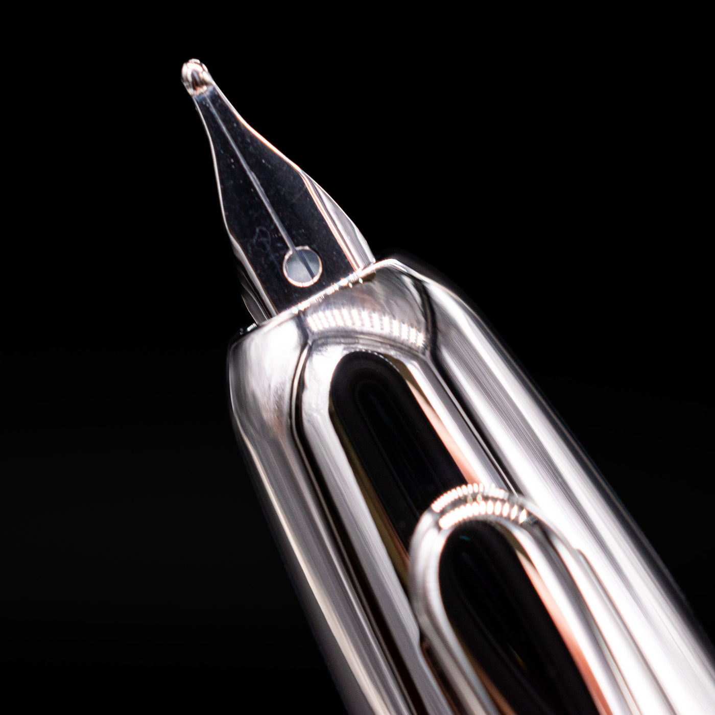 A close-up shot of the nib on the Pilot Vanishing Point SE Fountain Pen - Marble Orange.
