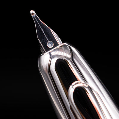 A close-up shot of the nib on the Pilot Vanishing Point SE Fountain Pen - Marble Orange.