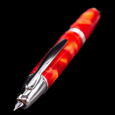 A full view of the Pilot Vanishing Point SE Fountain Pen - Marble Orange with a focus on the nib activated.