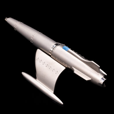 The stand and Romain Jerome Moon Fighter Rollerball Pen - Heavy Metal together.