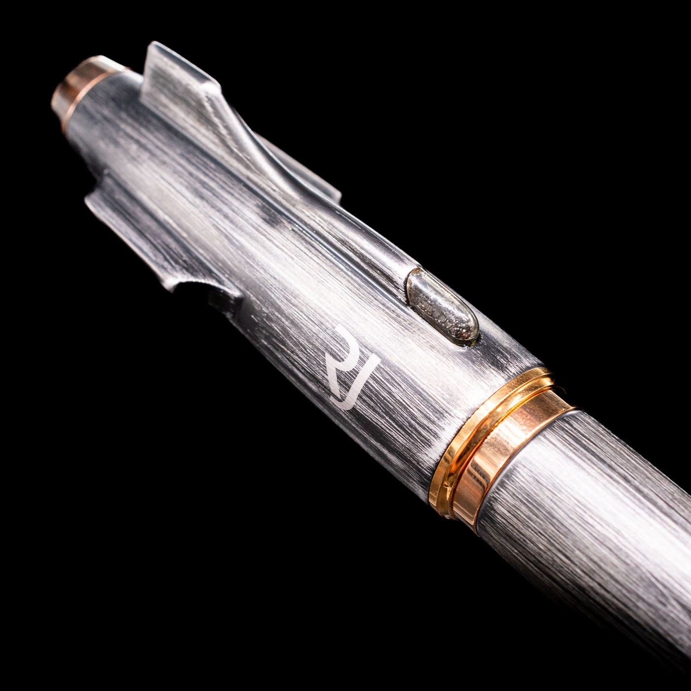 Close-up view of the cap on the Romain Jerome Moon Fighter Rollerball Pen - Vintage Finish.