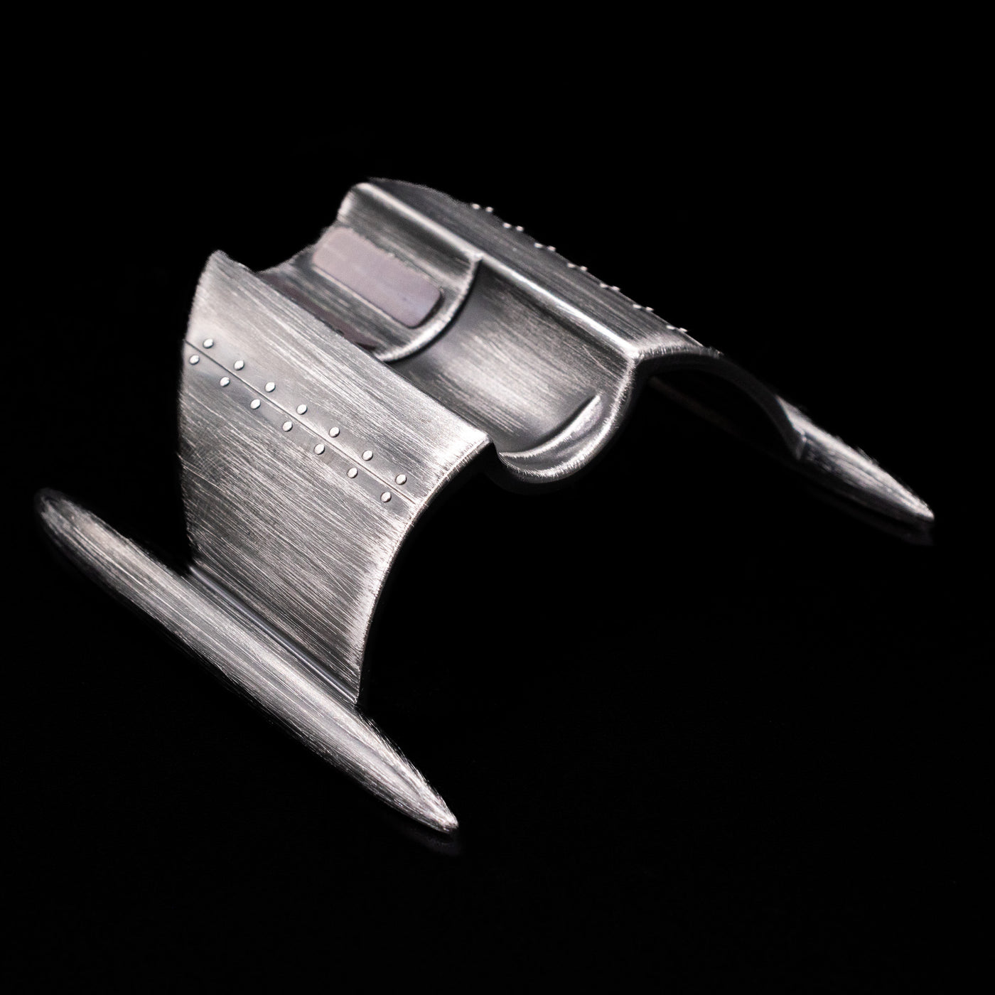 The stand on the Romain Jerome Moon Fighter Rollerball Pen - Vintage Finish.