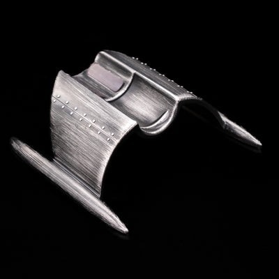 The stand on the Romain Jerome Moon Fighter Rollerball Pen - Vintage Finish.