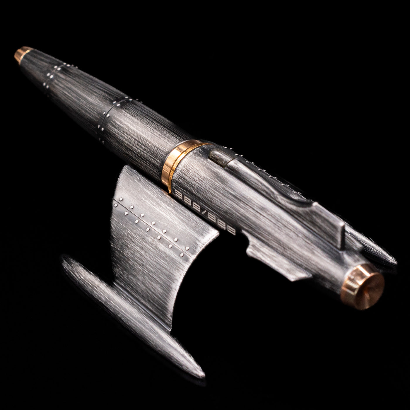 Romain Jerome Moon Fighter Rollerball Pen - Vintage Finish pen together with its stand.