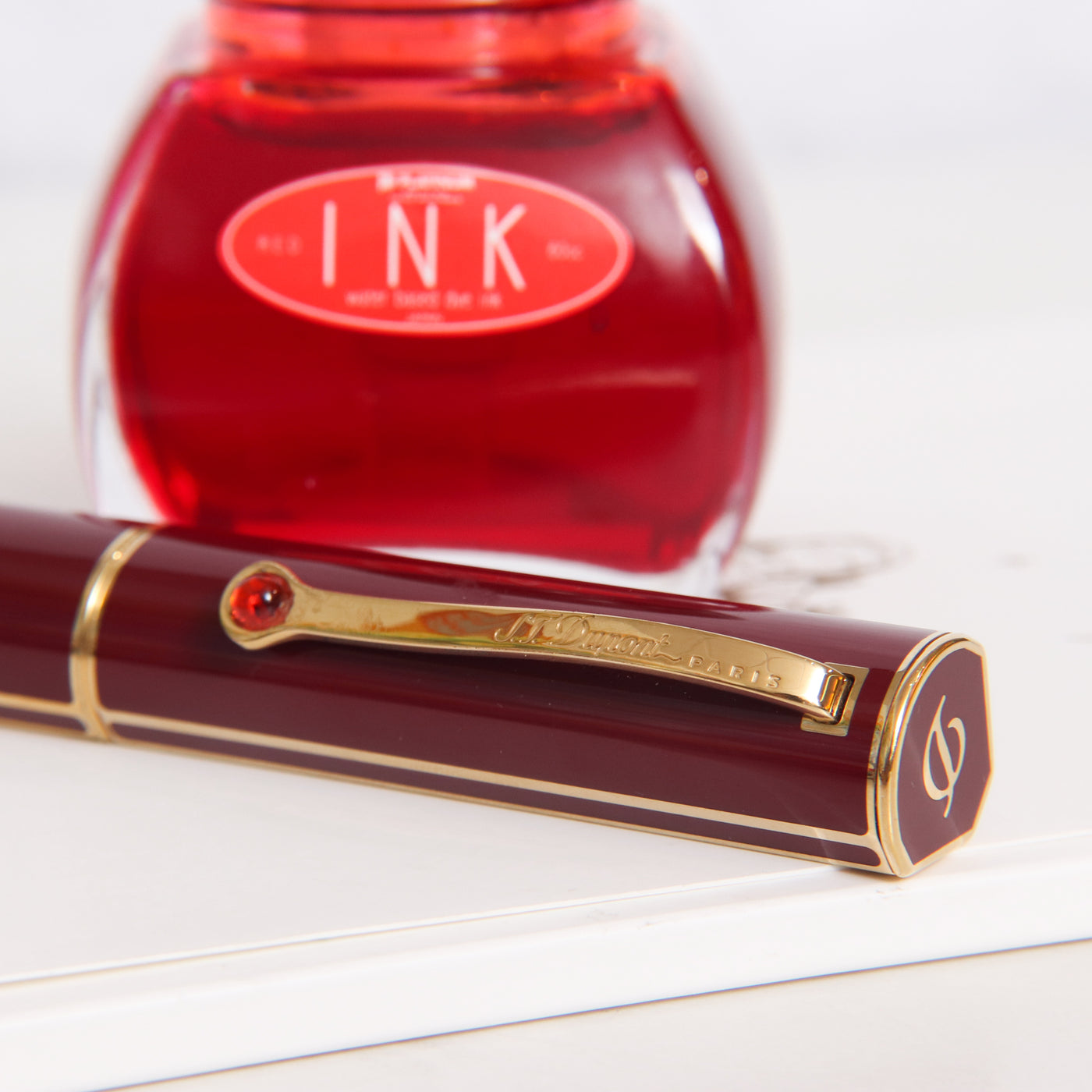 ST Dupont Mon Dupont Karl Lagerfeld Lotus Red Rollerball Pen - Preowned Engraved Clip with Stone