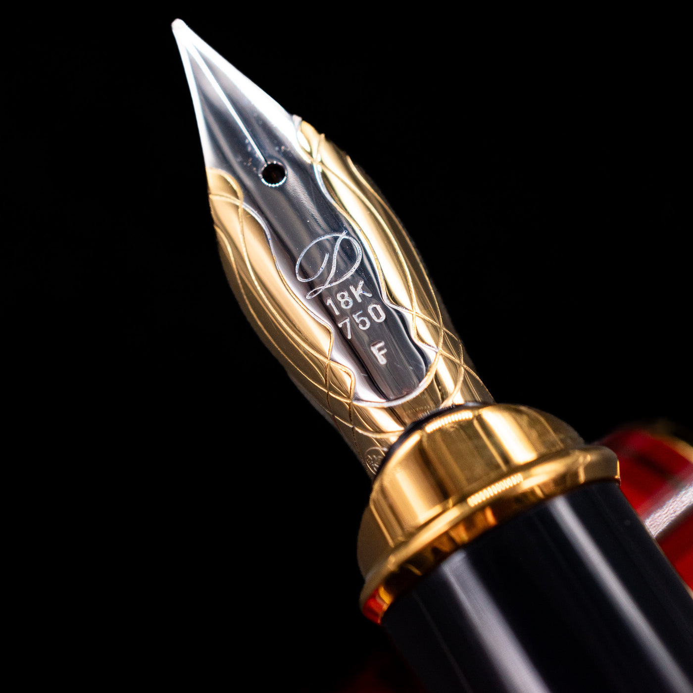A macro shot of the nib with its intricate detailing and logo engraving for the ST Dupont Olympio Vertigo Fountain Pen - Preowned.