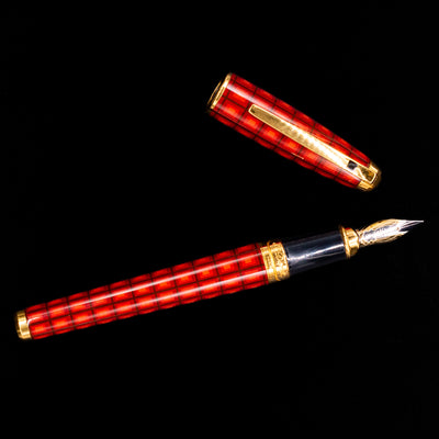 An overhead view of the ST Dupont Olympio Vertigo Fountain Pen - Preowned uncapped.