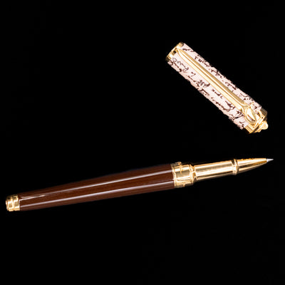 An overhead view of the ST Dupont William Shakespeare Rollerball Pen - Preowned uncapped.