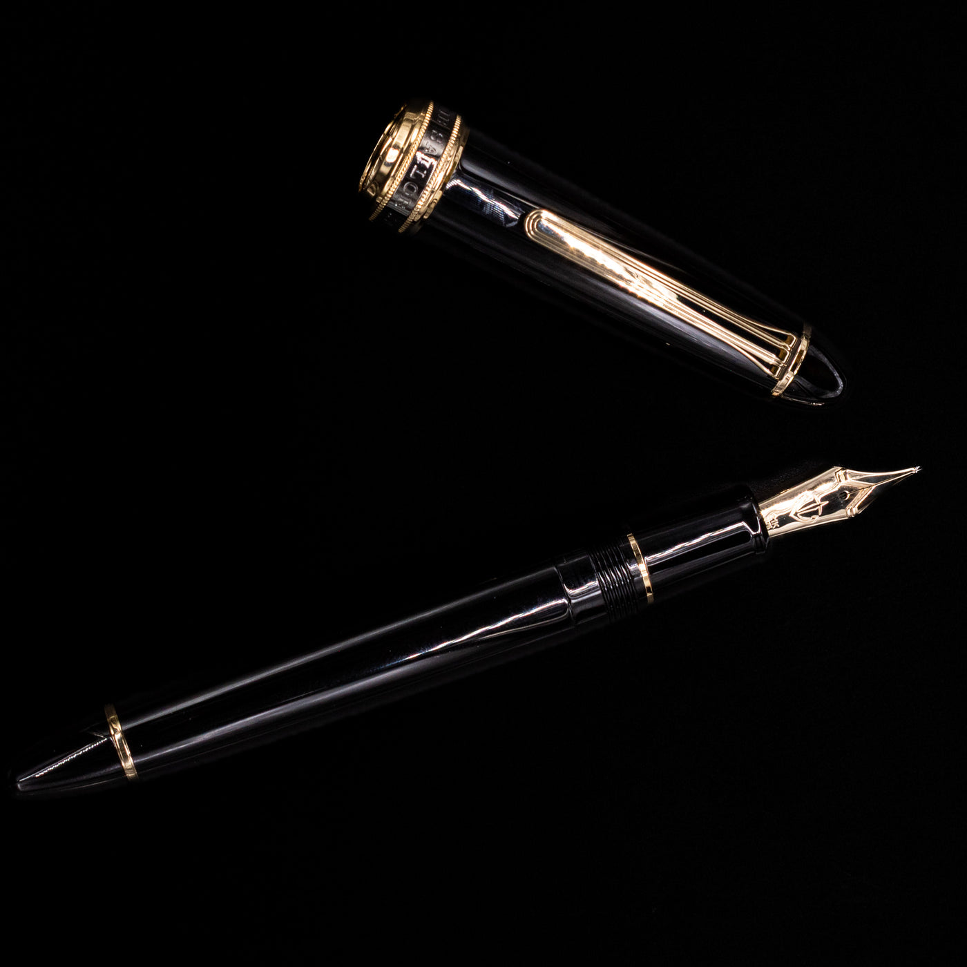 An overhead view of the Sailor 1911L Fountain Pen - Black / King Eagle Nib uncapped.