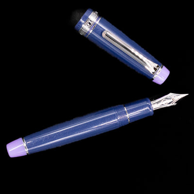 An overhead view of the Sailor Professional Gear King of Pens Fountain Pen - Storm over the Ocean uncapped.