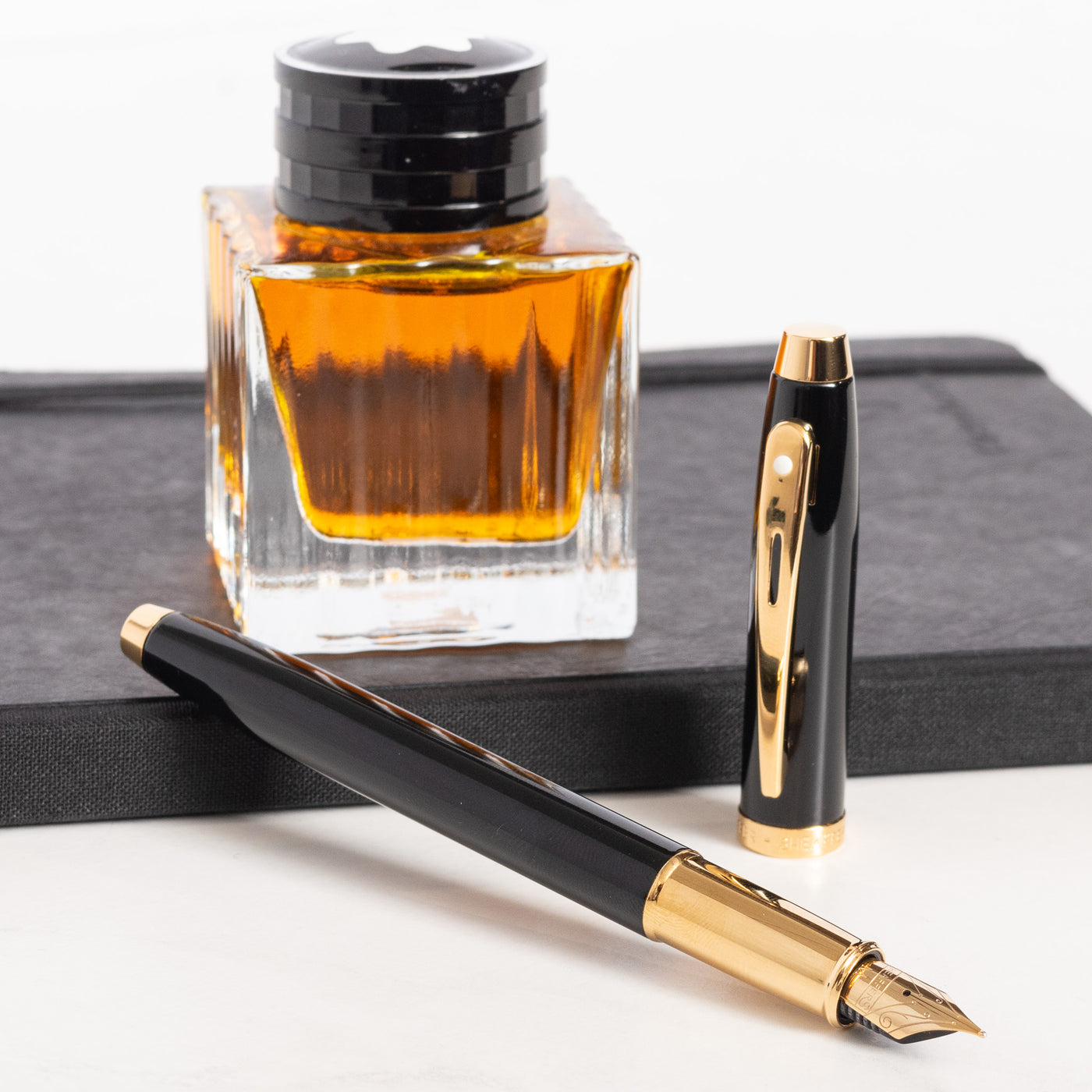 Sheaffer 100 Fountain Pen - Black with Gold Trim uncapped