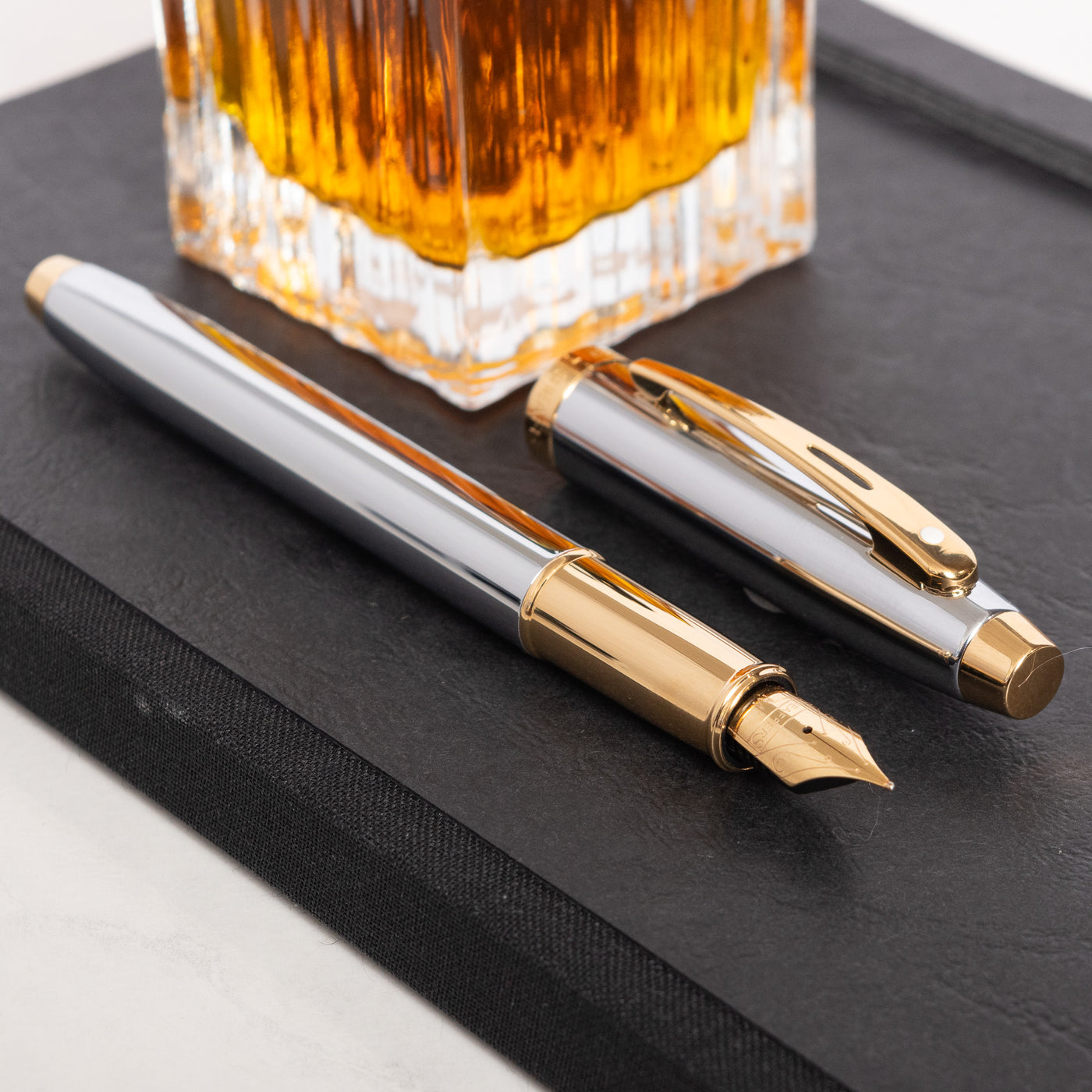 Sheaffer 100 Fountain Pen - Chrome with Gold Trim metal