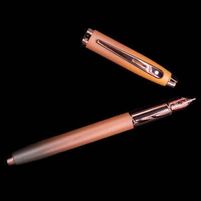 An overhead view of the Sheaffer 100 Fountain Pen - Coffee (Special Edition) uncapped. 