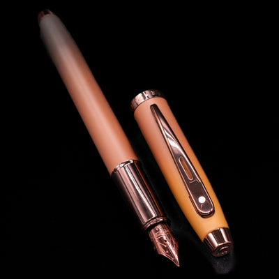  A full view of the Sheaffer 100 Fountain Pen - Coffee (Special Edition) uncapped, with its cap laying next to the pen. 