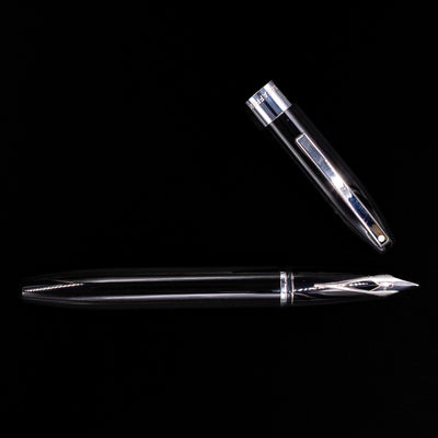 An overhead view of the Sheaffer Legacy Fountain Pen - Black uncapped. 