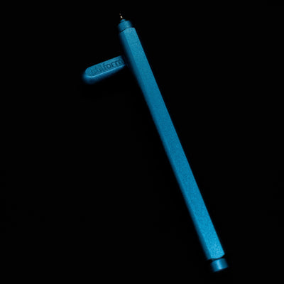 Stilform ARC Gel Pen – Night Sky Aluminum laying on top of its cap in a crossed position showing full view of the entire uncapped pen.