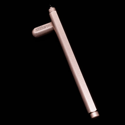 Stilform ARC Gel Pen – Rose Moon Aluminium laying on top of its cap in a crossed position showing full view of the entire uncapped pen.