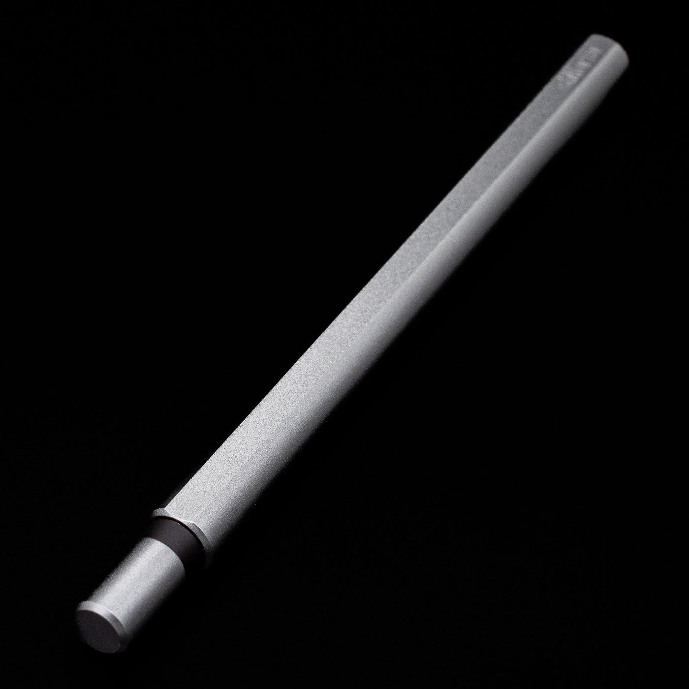 A full view of the Stilform FLOW Rollerball Pen – Comet Grey Aluminum capped but activated.