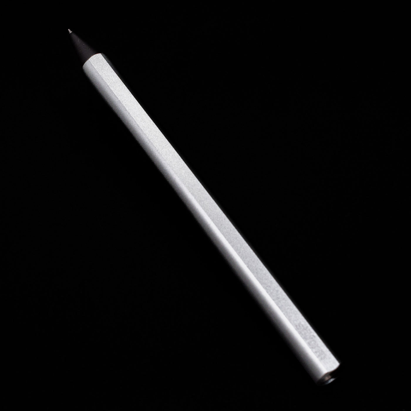 A full view of the Stilform FLOW Rollerball Pen – Comet Grey Aluminum uncapped.