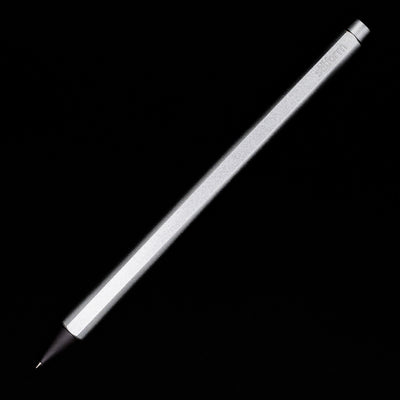 An overhead view of the Stilform FLOW Rollerball Pen – Comet Grey Aluminum uncapped.