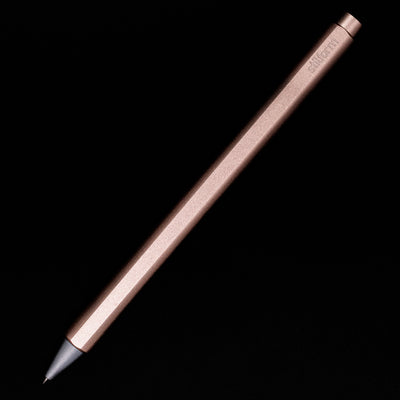 An overhead view of the Stilform FLOW Rollerball Pen – Rose Moon Aluminium posted.