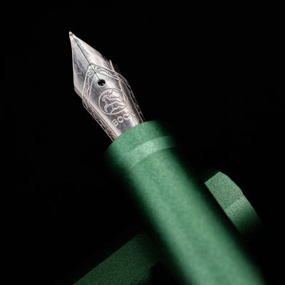 A macro shot of the nib with its intricate detailing and logo engraving for the Stilform INK Fountain Pen – Aurora Green Aluminum.