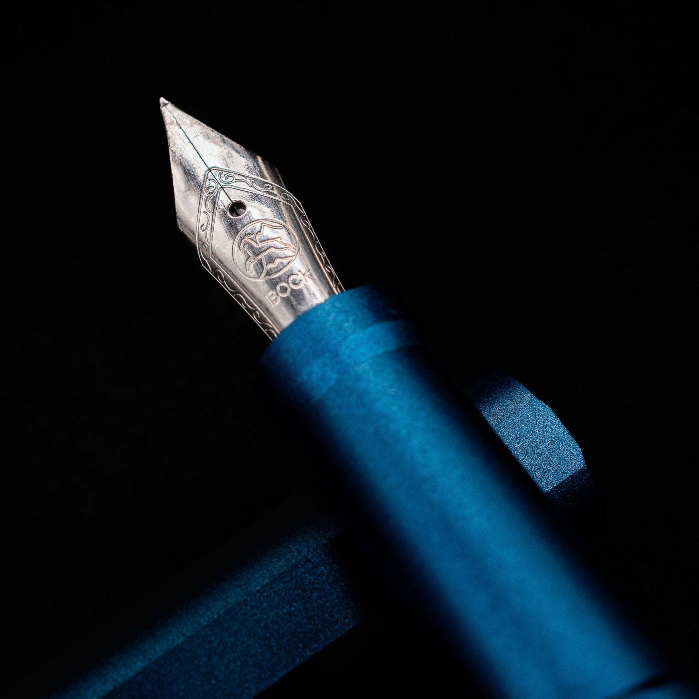 A macro shot of the nib with its intricate detailing and logo engraving for the Stilform INK Fountain Pen – Night Sky Aluminum.