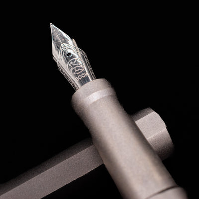 A macro shot of the nib with its intricate detailing and logo engraving for the Stilform INK Fountain Pen – Titanium Matte.