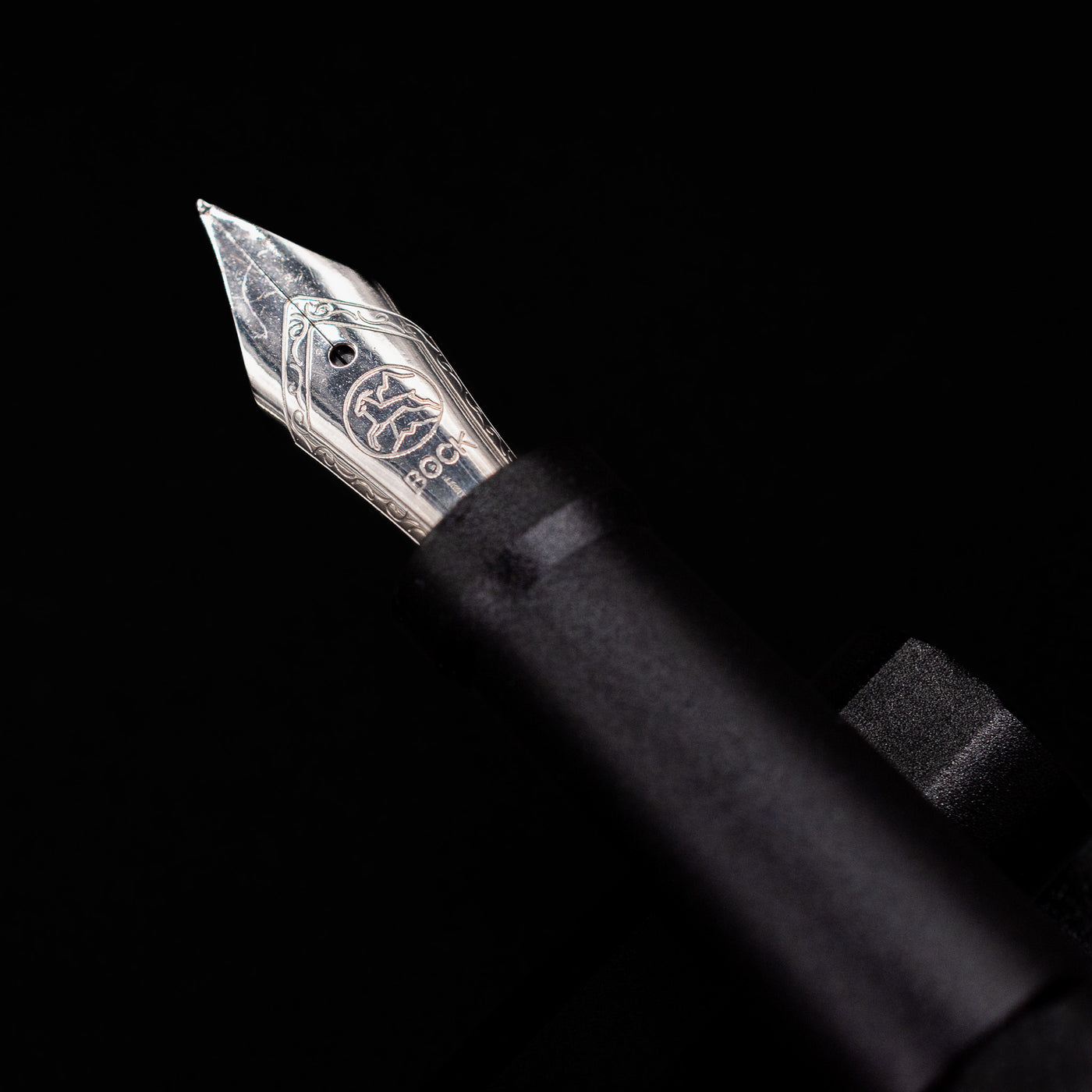 A macro shot of the nib with its intricate detailing and logo engraving for the Stilform INK Fountain Pen – Warp Black Aluminum.