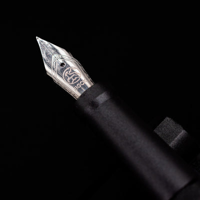 A macro shot of the nib with its intricate detailing and logo engraving for the Stilform INK Fountain Pen – Warp Black Aluminum.
