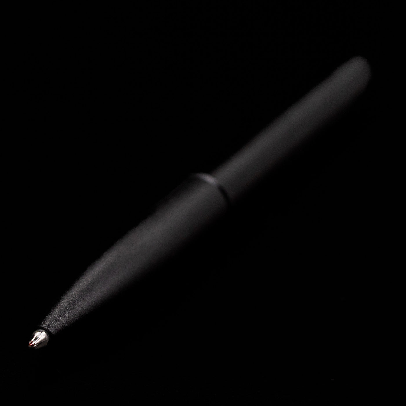 Full view of the Stilform PEN Ballpoint Pen – Warp Black Aluminum showcasing its tip.