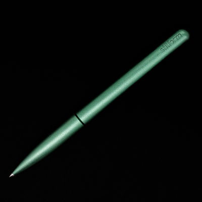An overhead view of the Stilform PEN Ballpoint Pen – Aurora Green Aluminum activated.
