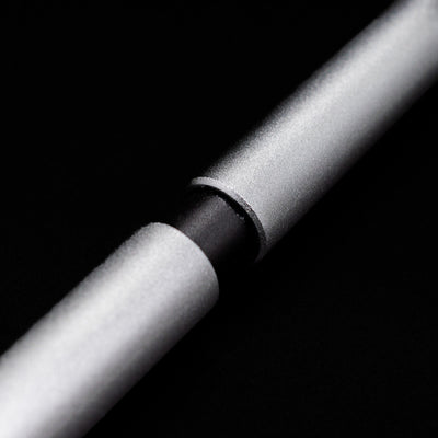 A macro shot of the part that activates the Stilform PEN Ballpoint Pen – Comet Grey Aluminum.