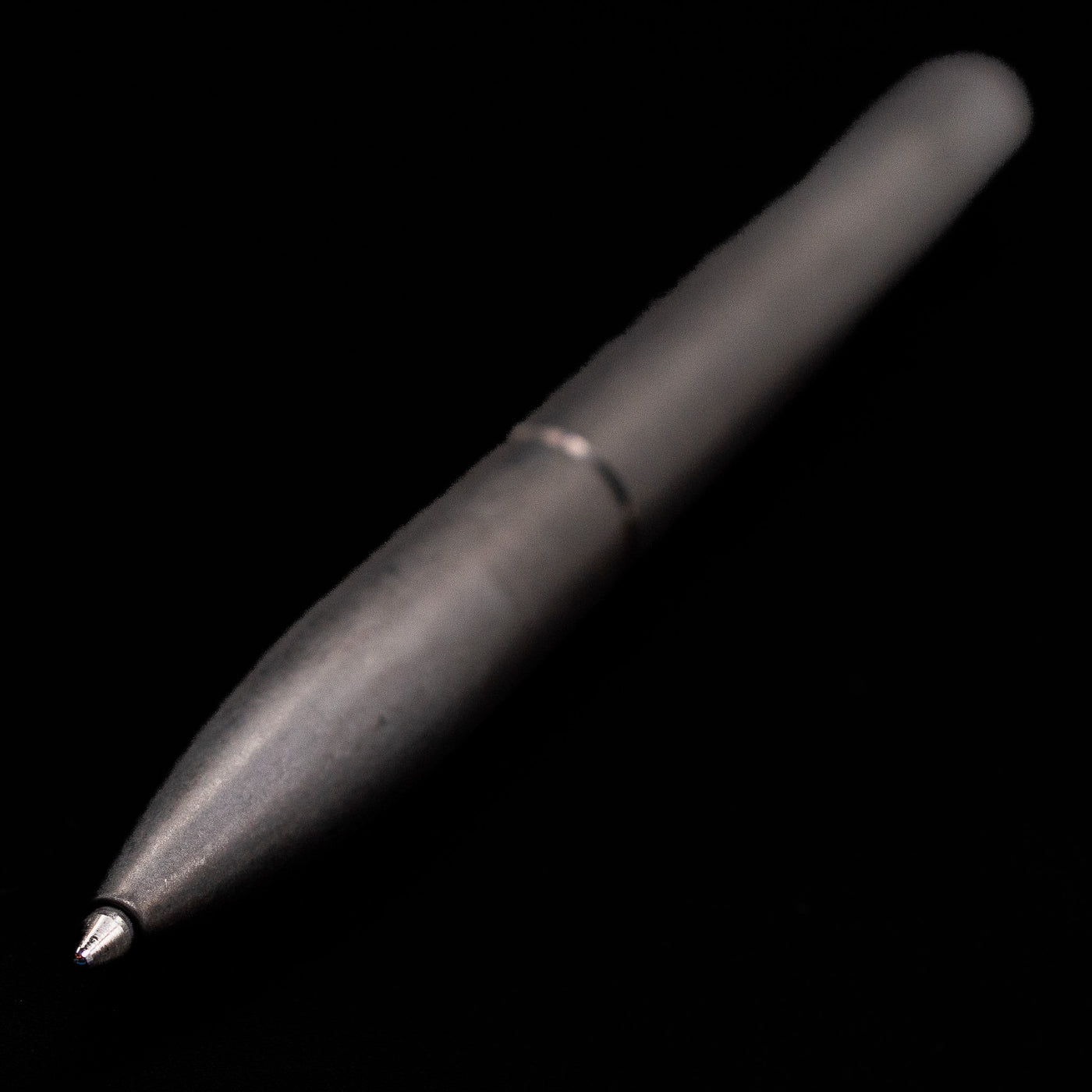 Full view of the Stilform PEN Ballpoint Pen – Titanium DLC at an angle showcasing its tip.