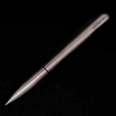 An overhead view of the Stilform PEN Ballpoint Pen – Titanium DLC activated.