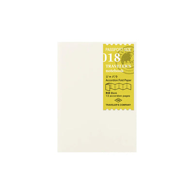 Cover of the TRAVELER’S COMPANY 018 Accordion Fold Paper Refill in Passport Size, shown in simple kraft packaging.

