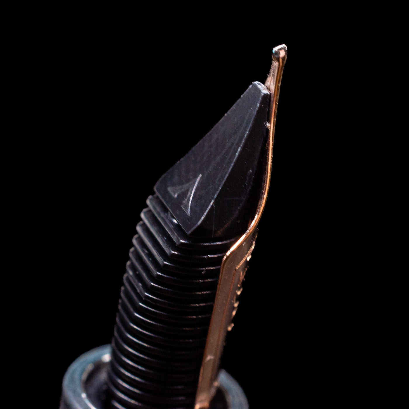 A macro shot showcasing the unique nib and its feed on the Visconti Homo Sapiens Bronze Age Fountain Pen - Architect Nib.