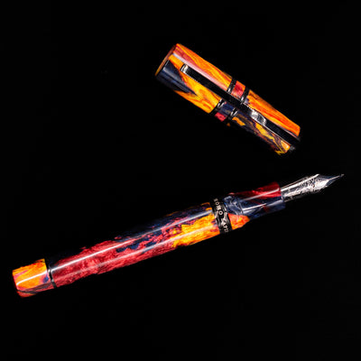 Overhead shot of the capped Visconti Homo Sapiens Earth Origins Fire edition pen, displaying the Visconti bridge clip.