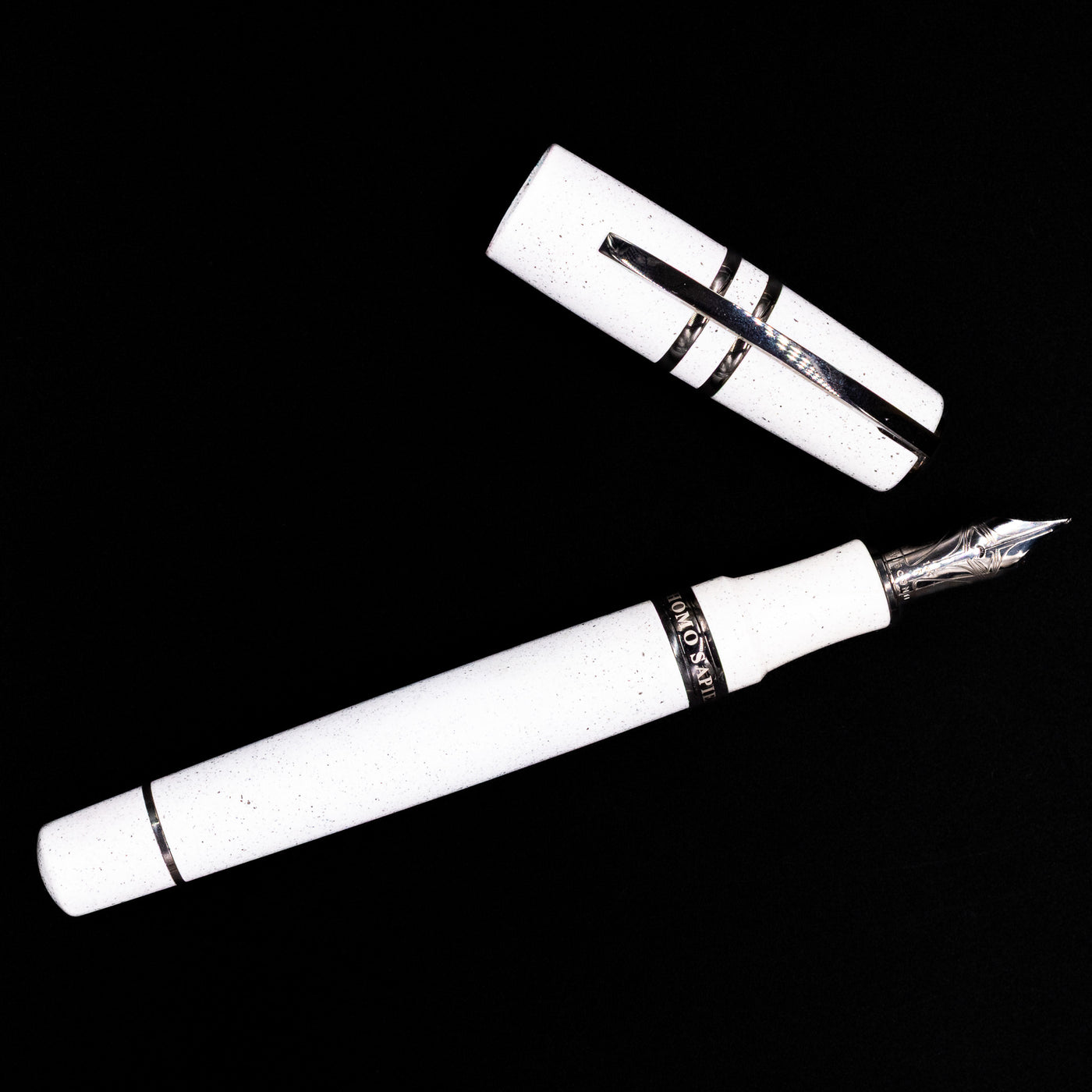 An overhead view of the Visconti Homo Sapiens Fountain Pen - Blizzard White uncapped.