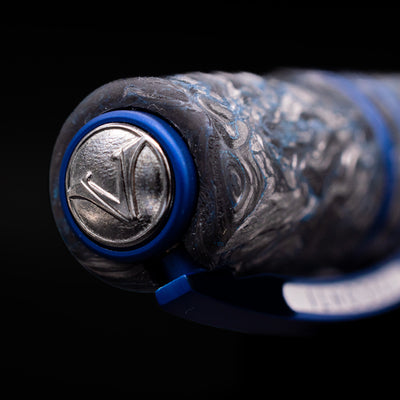 Zoomed-in view of the top of the cap with the finial on the Visconti Homo Sapiens Fountain Pen - Carbon Abyssus.